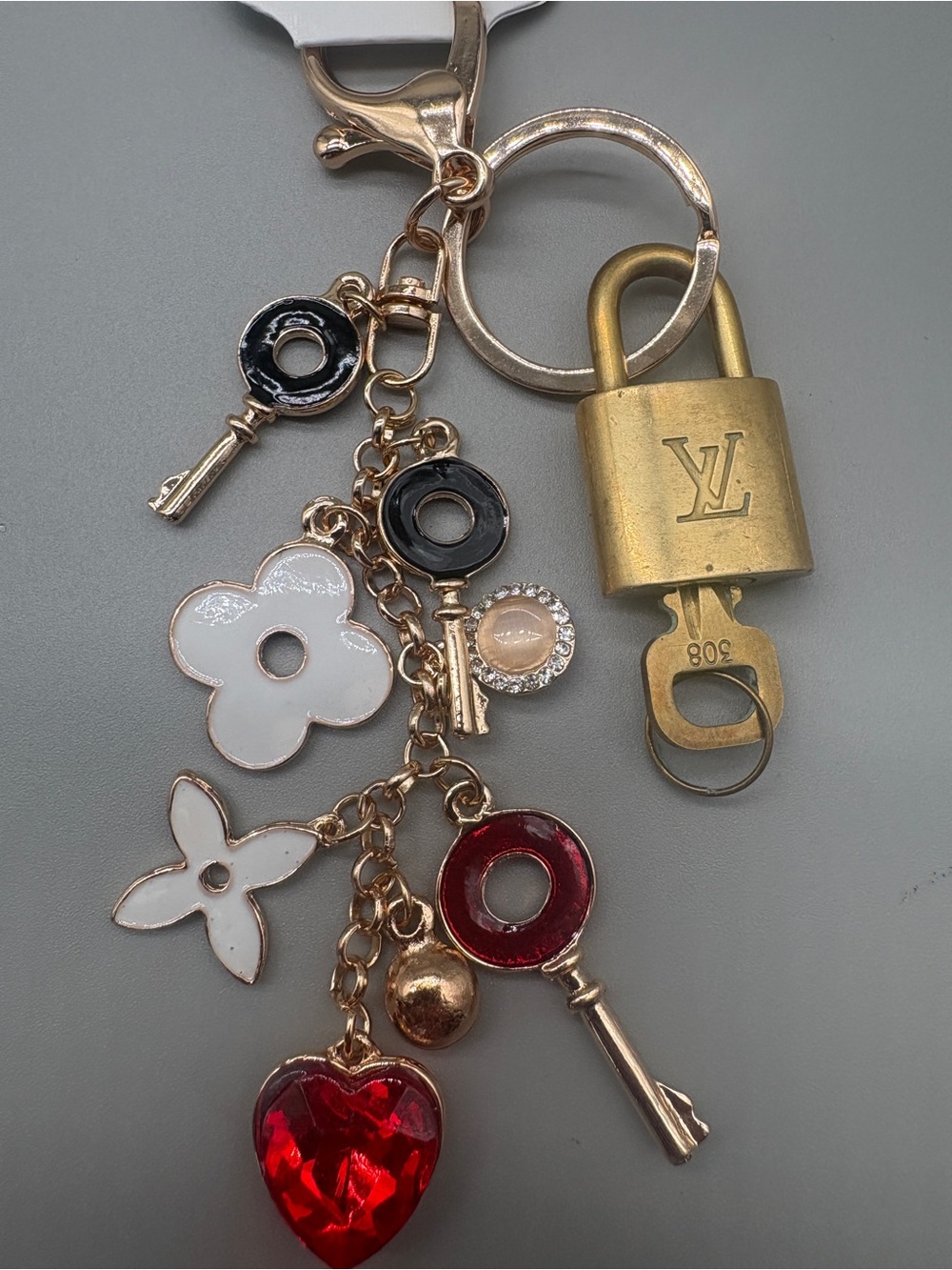 Authentic Louis Vuitton Padlock & Key on Unbranded Decorative Bag Charm